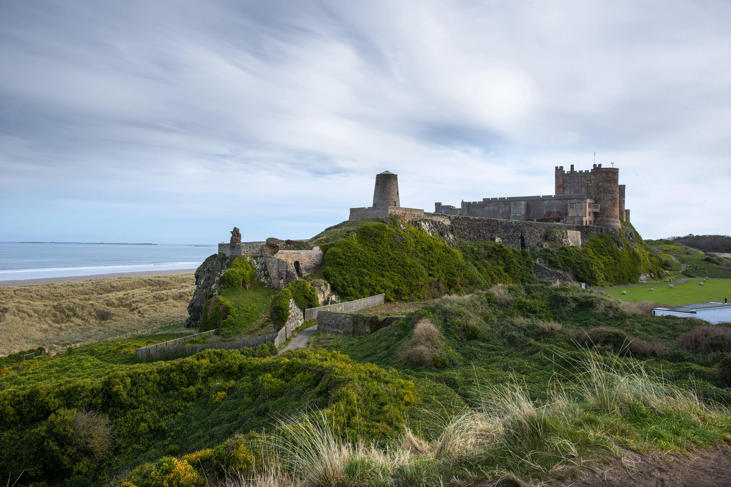 Image looking towards Bamburgh Castle in Northumberland with North Sea in background