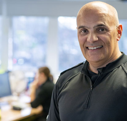 Image of Police Constable Phil Hamlani in the office