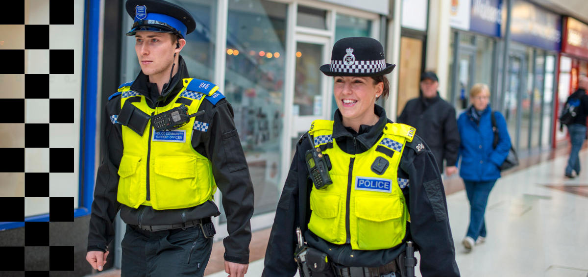 Female officer and male PCSO walking on patrol